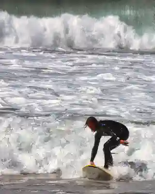 Georg bsurfing in whitewater