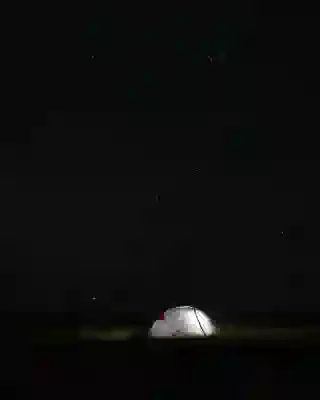 Nightsky and starlight with our tent.