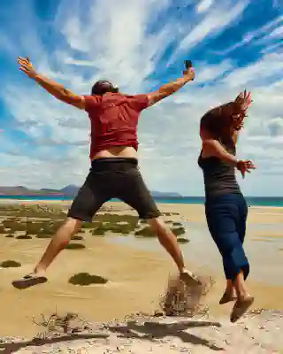 Jumping photo of Georg, Jo at the lagoon.