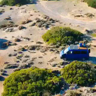 Our T4 at Elafonisi in Crete, Jo and Gerog sitting on the roof