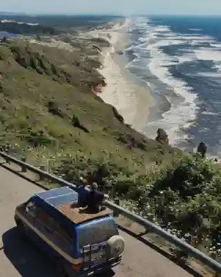 The Quest in front of the Oregon coastline.